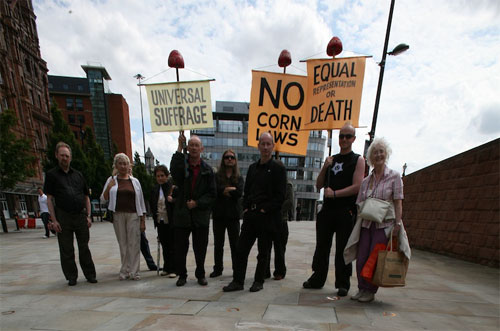 campaign members commemorating the anniversary with period banners